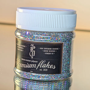 Transparente Dose mit holografisch glitzernden glitte in Regenbogenfaben von south ink premium flakes